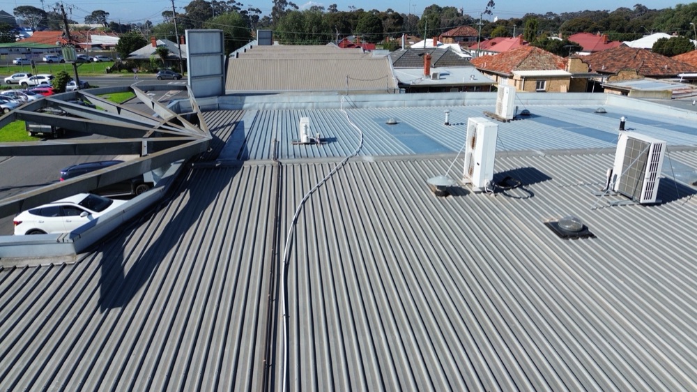 Debris left on the roof, reducing drainage, noted during a pre-purchase inspection in Deer Park, in Melbourne's west