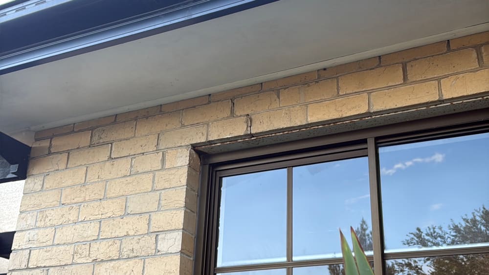 Cracked brickwork above a window, found during a pre-purchase inspection in Reservoir