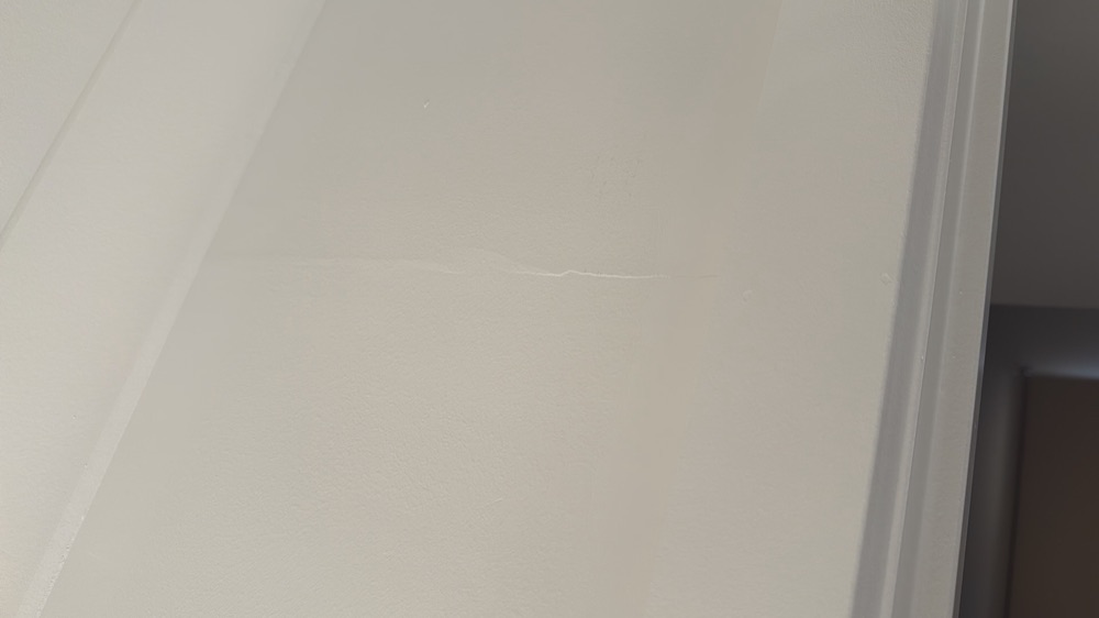 Walls bowed outside the 5mm tolerance, noted during a pre-handover inspection in Melton South
