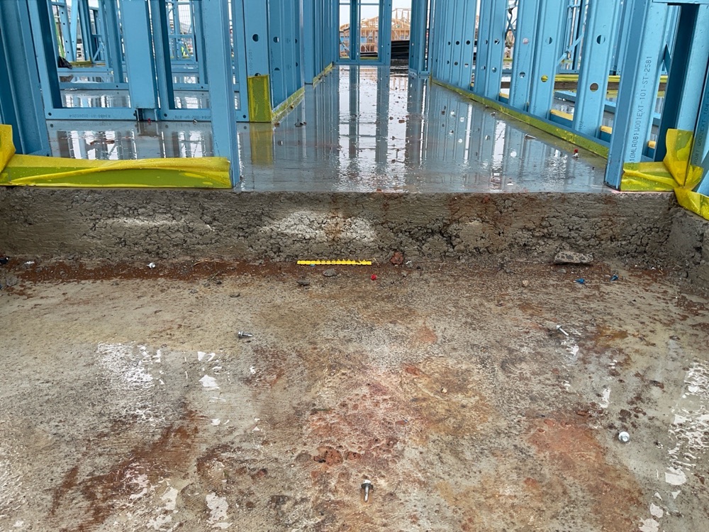 Honeycombing noted along the slab edge, noted during a frame inspection in Melton South