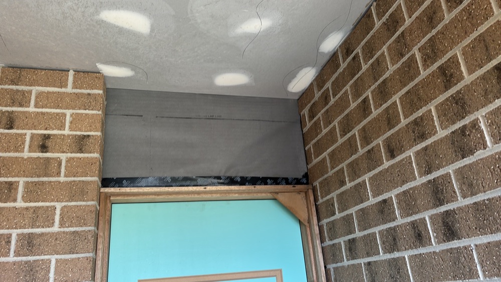 Infill or caulking missing at door heads and sides, noted during a fixing inspection in Melton South